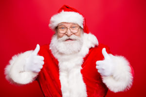 Stylish aged Santa with beard in noel costume spectacles white g